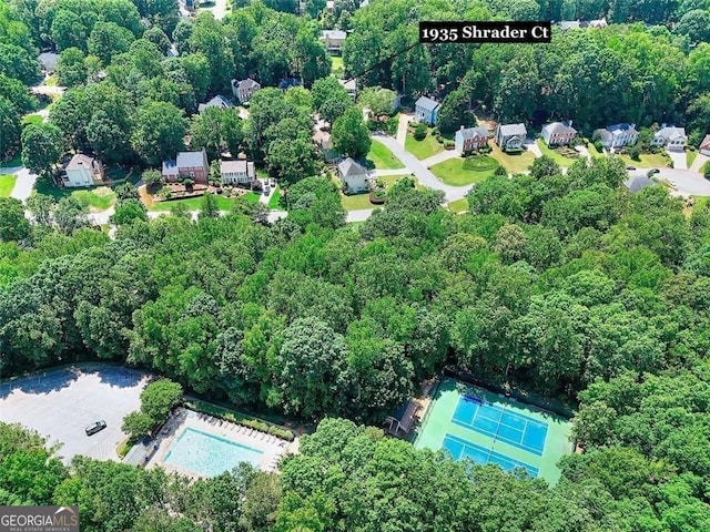 1935 Shrader Ct, Lawrenceville, GA 30044 - aerial view of property and surrounding area featuring a pool area and a forest