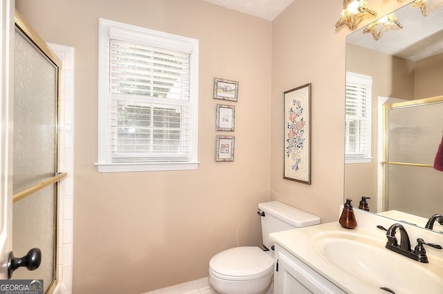 1935 Shrader Ct, Lawrenceville, GA 30044 - full bath featuring a shower with shower door, toilet, and vanity
