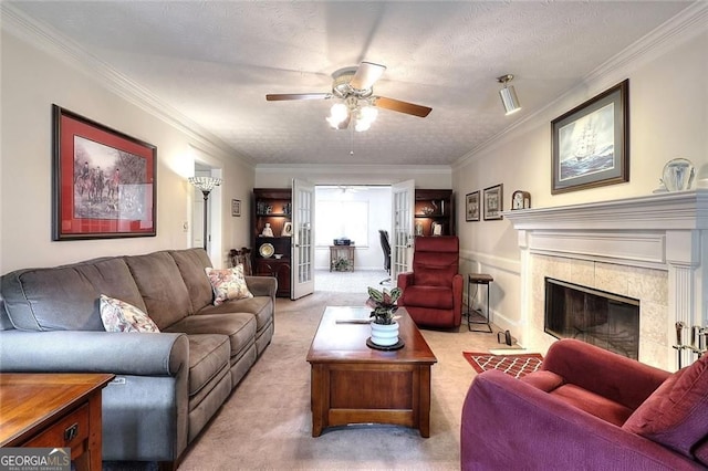 1935 Shrader Ct, Lawrenceville, GA 30044 - living area with a ceiling fan, carpet, a premium fireplace, and crown molding