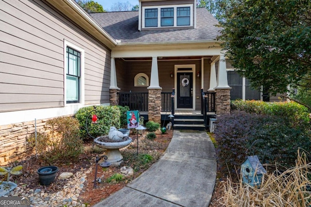 106 Dupont Ct, Dallas, GA 30132 - entrance to property with a porch, roof with shingles, and stone siding