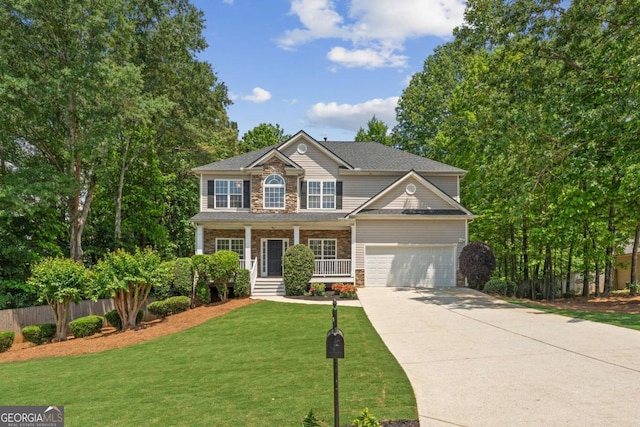 view of front of home with concrete driveway, a garage, and a porch