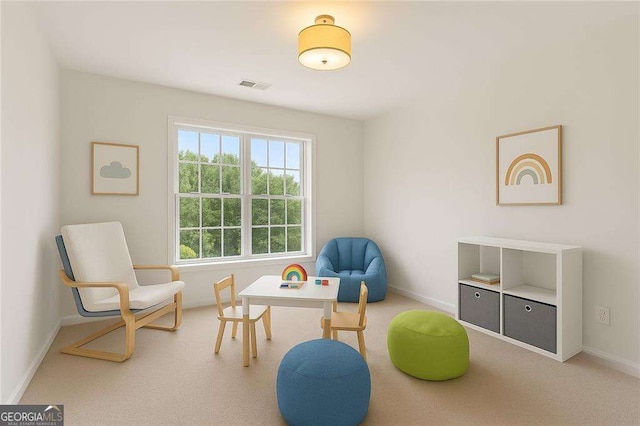 game room featuring baseboards and carpet floors