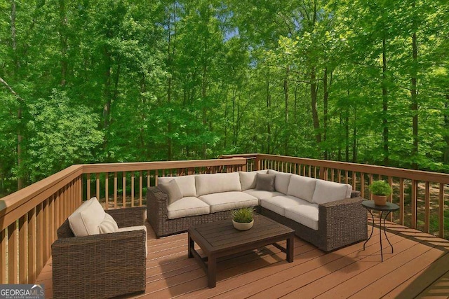 wooden deck with an outdoor living space