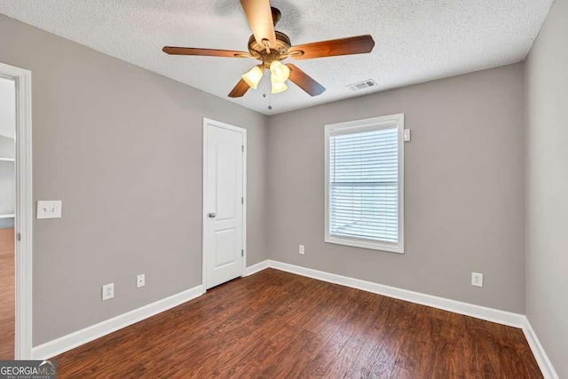 252 River Mist Cir, Jefferson, GA 30549 - unfurnished room featuring a ceiling fan, baseboards, wood finished floors, and a textured ceiling