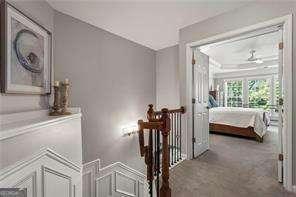 1667 Wehunt Pl SE Unit 11, Smyrna, GA 30082 - hall with carpet and an upstairs landing