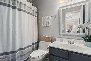 1667 Wehunt Pl SE Unit 11, Smyrna, GA 30082 - bathroom with toilet and vanity