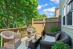 1667 Wehunt Pl SE Unit 11, Smyrna, GA 30082 - wooden deck featuring an outdoor hangout area
