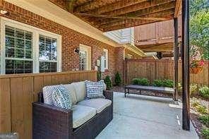 1667 Wehunt Pl SE Unit 11, Smyrna, GA 30082 - view of patio / terrace featuring outdoor lounge area and fence