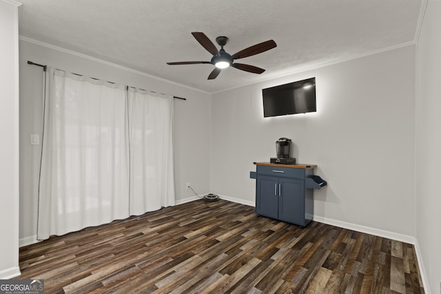 111 Northdale Pl, Lawrenceville, GA 30046 - unfurnished living room with ceiling fan, dark wood-type flooring, baseboards, crown molding, and a textured ceiling