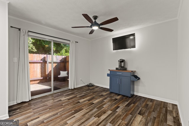 111 Northdale Pl, Lawrenceville, GA 30046 - unfurnished living room with dark wood-type flooring, ceiling fan, baseboards, and ornamental molding