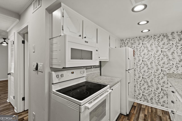 111 Northdale Pl, Lawrenceville, GA 30046 - kitchen featuring white appliances, wallpapered walls, dark wood-style flooring, baseboards, and white cabinets