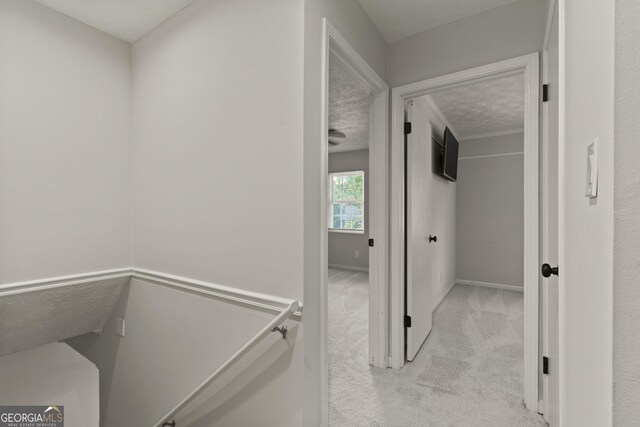 111 Northdale Pl, Lawrenceville, GA 30046 - hall featuring light colored carpet, a textured ceiling, and baseboards