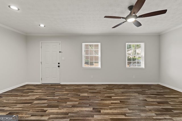 111 Northdale Pl, Lawrenceville, GA 30046 - unfurnished room featuring dark wood-type flooring, ceiling fan, baseboards, a textured ceiling, and ornamental molding
