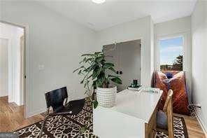 219 Howell Dr SE Unit A, Atlanta, GA 30316 - dining space with wood finished floors and baseboards