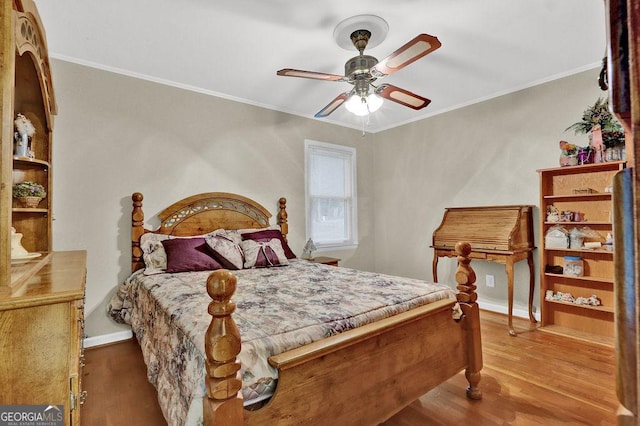200 Dogwood Dr, Canton, GA 30114 - bedroom featuring wood finished floors, ornamental molding, baseboards, and ceiling fan
