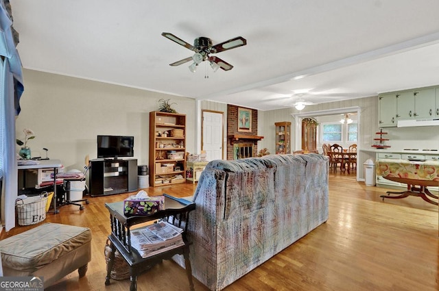200 Dogwood Dr, Canton, GA 30114 - living area featuring ceiling fan, light wood finished floors, a desk, and crown molding