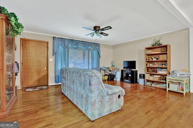 200 Dogwood Dr, Canton, GA 30114 - living area with crown molding, ceiling fan, and wood finished floors