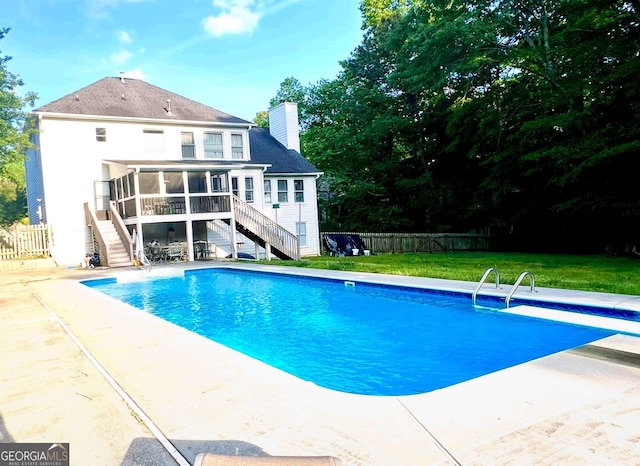 402 Hancock Ct, Woodstock, GA 30188 - view of pool with stairway, a sunroom, a patio, and a diving board
