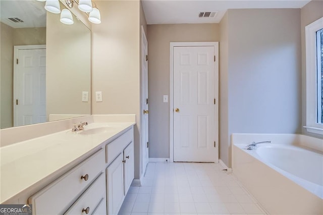 402 Hancock Ct, Woodstock, GA 30188 - bathroom featuring baseboards, vanity, a bath, and a chandelier