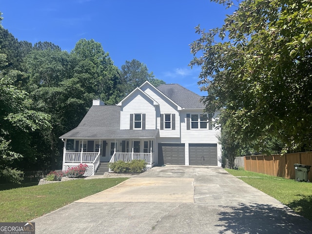 402 Hancock Ct, Woodstock, GA 30188 - view of front facade featuring a porch, driveway, an attached garage, a chimney, and roof with shingles