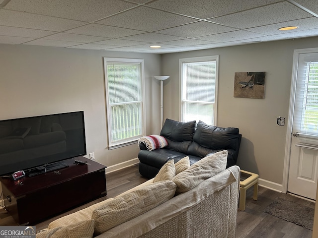 402 Hancock Ct, Woodstock, GA 30188 - living room featuring wood finished floors, baseboards, and a drop ceiling