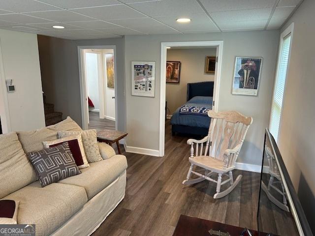 402 Hancock Ct, Woodstock, GA 30188 - living area with a paneled ceiling, baseboards, stairs, wood finished floors, and recessed lighting