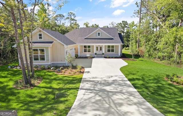 108 Branch Creek Rd, Woodbine, GA 31569 - traditional-style home with driveway, board and batten siding, roof with shingles, and a front yard