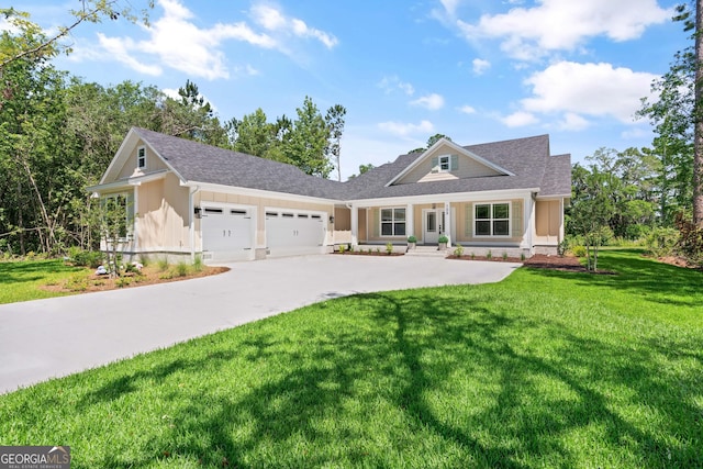 108 Branch Creek Rd, Woodbine, GA 31569 - view of front of house featuring an attached garage, driveway, a front lawn, and board and batten siding