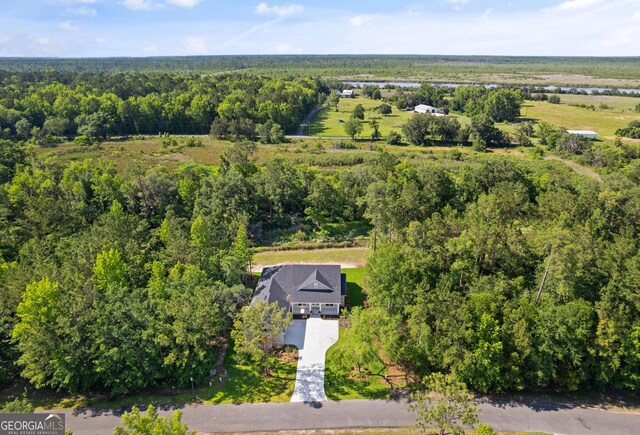 108 Branch Creek Rd, Woodbine, GA 31569 - aerial view of property and surrounding area with a heavily wooded area
