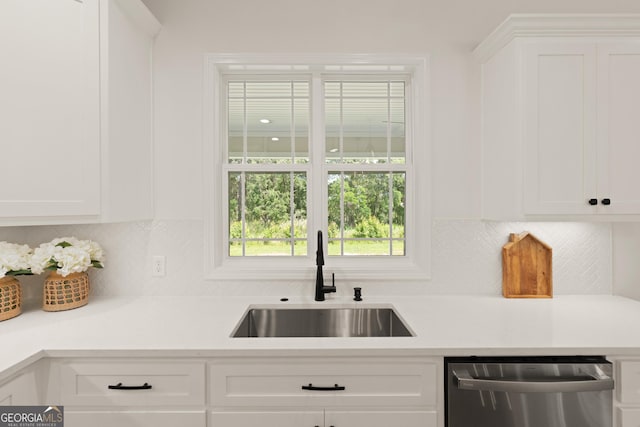 108 Branch Creek Rd, Woodbine, GA 31569 - kitchen featuring dishwasher, a sink, white cabinets, and light countertops
