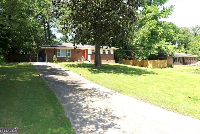 579 Kenridge Cir, Stone Mountain, GA 30083 - ranch-style house with asphalt driveway and brick siding