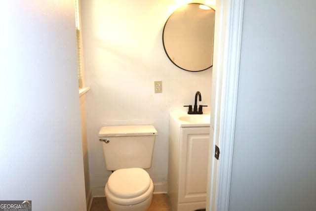 579 Kenridge Cir, Stone Mountain, GA 30083 - half bathroom with toilet and vanity