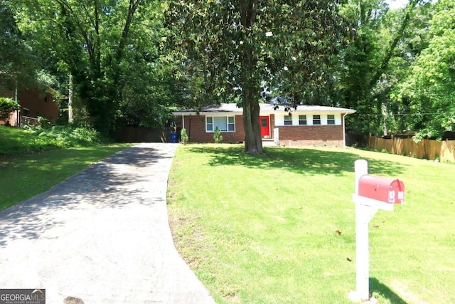 579 Kenridge Cir, Stone Mountain, GA 30083 - ranch-style home featuring brick siding and asphalt driveway