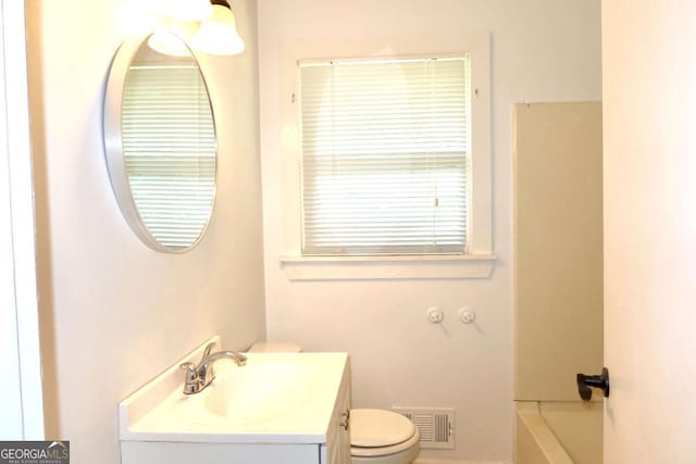579 Kenridge Cir, Stone Mountain, GA 30083 - bathroom with vanity and toilet