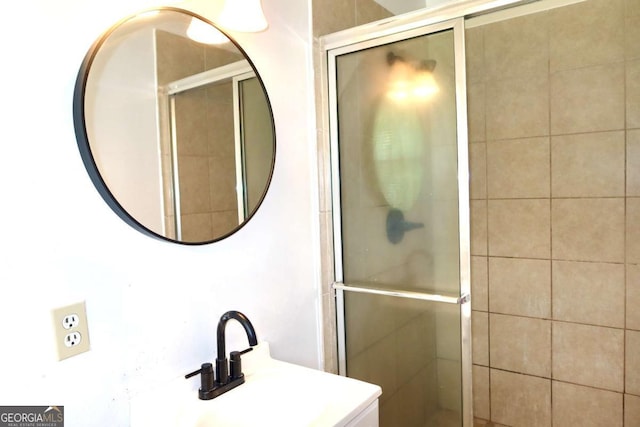 579 Kenridge Cir, Stone Mountain, GA 30083 - bathroom with a shower stall and a sink