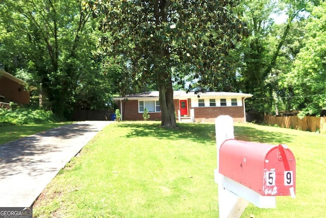 579 Kenridge Cir, Stone Mountain, GA 30083 - ranch-style house featuring brick siding and driveway