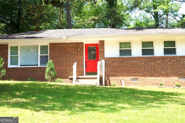 579 Kenridge Cir, Stone Mountain, GA 30083 - ranch-style house with a front lawn and brick siding