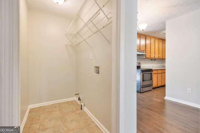 1602 Sycamore Dr NW, Kennesaw, GA 30152 - washroom featuring hookup for a washing machine and baseboards