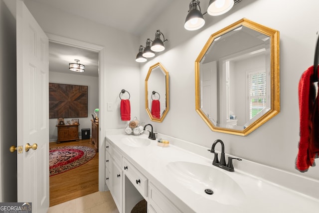 full bathroom with double vanity and tile patterned floors