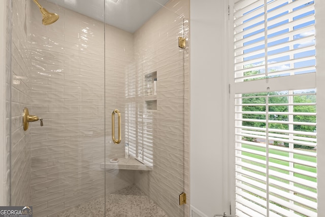 full bathroom featuring a stall shower
