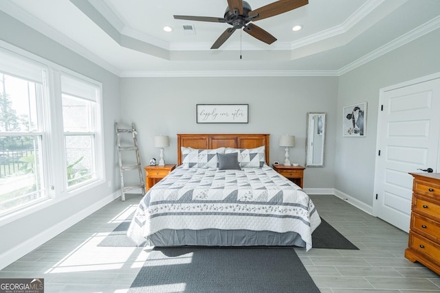 133 Ryan Nicholas Dr, Kingsland, GA 31548 - bedroom with a tray ceiling, recessed lighting, ornamental molding, baseboards, and a ceiling fan