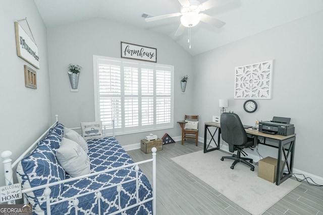 133 Ryan Nicholas Dr, Kingsland, GA 31548 - bedroom featuring vaulted ceiling, wood finished floors, baseboards, a desk, and a ceiling fan