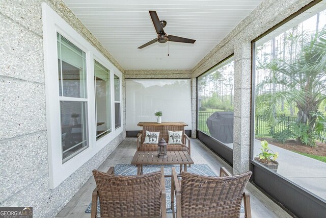 133 Ryan Nicholas Dr, Kingsland, GA 31548 - sunroom featuring ceiling fan and outdoor lounge area