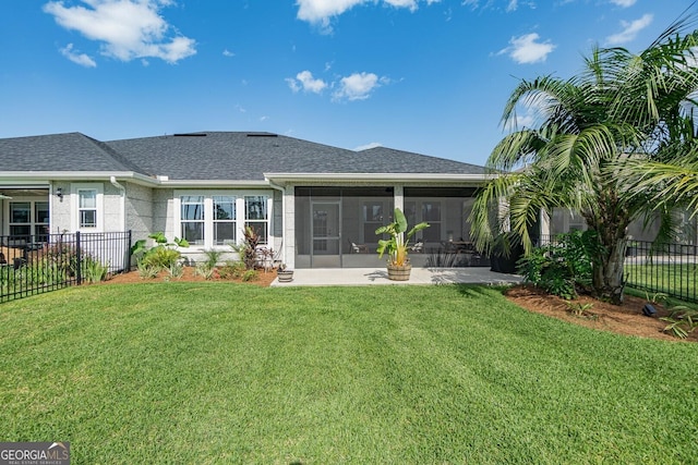 133 Ryan Nicholas Dr, Kingsland, GA 31548 - back of house featuring a sunroom and a shingled roof