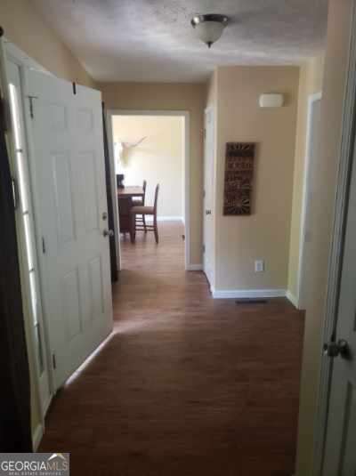 1383 Sims Rd SE, Winder, GA 30680 - hall featuring baseboards and wood finished floors