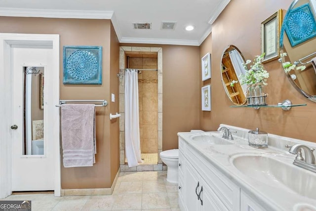 bathroom featuring a stall shower, ornamental molding, toilet, baseboards, and double vanity
