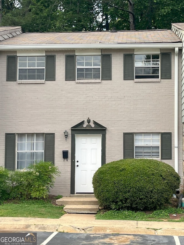 4701 Flat Shoals Rd Unit 41-F, Union City, GA 30291 - view of front of home with brick siding and uncovered parking
