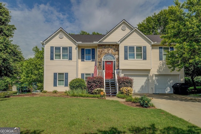 3870 Michaels Creek Ct, Loganville, GA 30052 - raised ranch with a garage, driveway, a front lawn, and stone siding