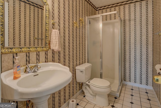 3870 Michaels Creek Ct, Loganville, GA 30052 - full bathroom with wallpapered walls, a shower stall, baseboards, tile patterned floors, and a sink