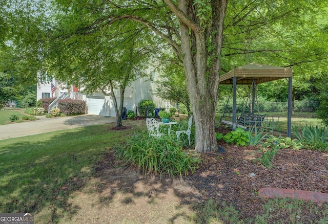 3870 Michaels Creek Ct, Loganville, GA 30052 - view of yard with concrete driveway